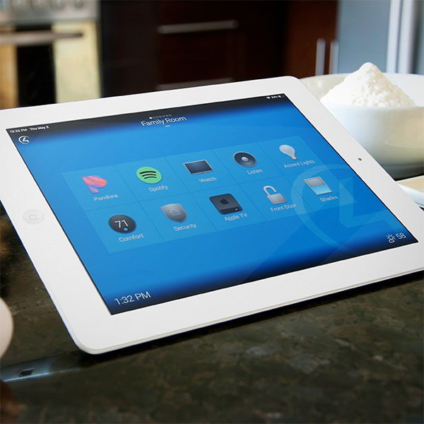An iPad showing the Control4 app in a automated kitchen